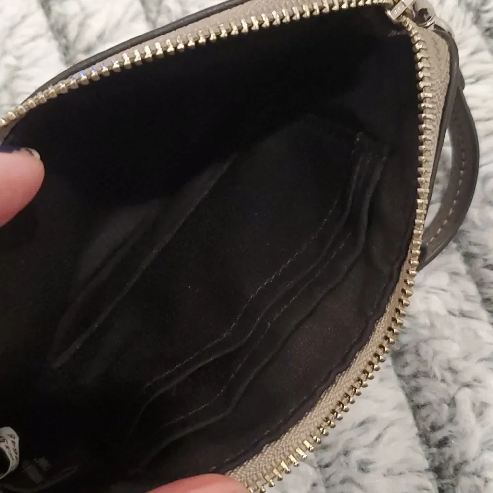 Cute metallic Coach bow wristlet